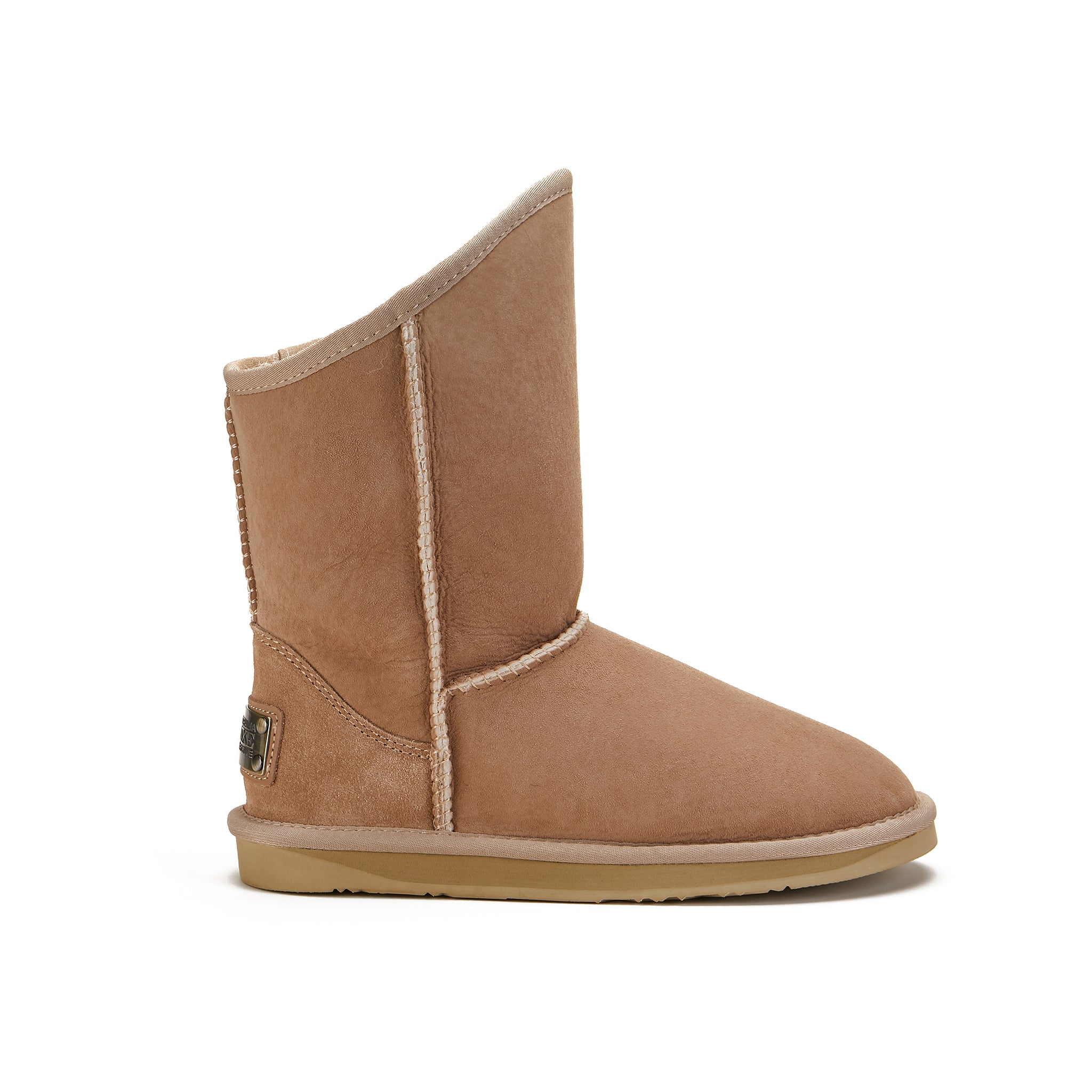 Luxe take on the classic ugg style pull on sheepskin boot in a